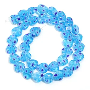 Blue heart millefiori glass beads strand detail for DIY bracelet making and jewelry accessories.