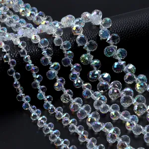 Detailed shot of AB coated clear crystal glass beads, perfect for DIY jewelry making.
