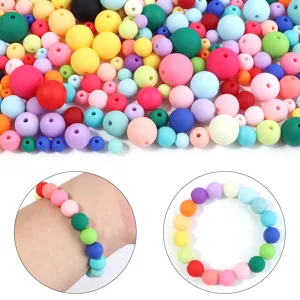Close-up details of colorful DIY round beads, smooth touch paint finish, perfect for jewelry making.
