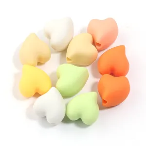 Colorful heart-shaped acrylic loose beads with matte touch paint for DIY jewelry making.