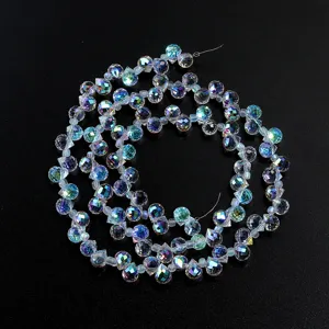 Crystal teardrop bead detail, AB coated iridescent glass gemstone, DIY jewelry accessory close-up
