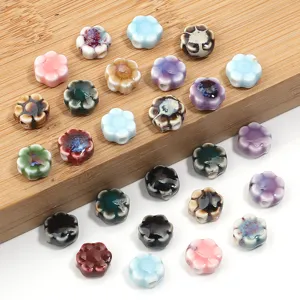 Perles en céramique marguerite fleurie trouées pour bracelets colliers faits maison DIY.