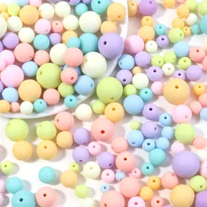 Colorful pastel acrylic round beads, 6-16mm DIY jewelry craft accessories supply display.