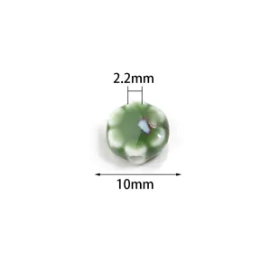 Perles de fleurs de marguerite en céramique verte blanche DIY bijoux collier 10mm