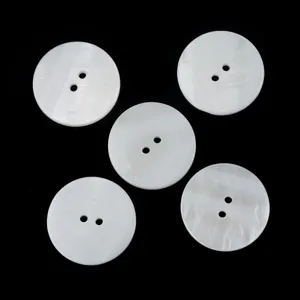 Natural mother-of-pearl white two-hole buttons for shirts and sewing accessories detail view