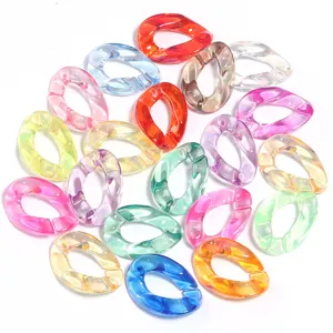 Detailed view of colorful translucent acrylic open ring links, perfect for creative DIY chains.
