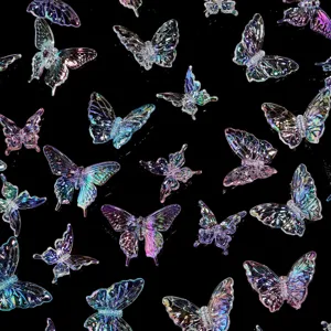 Detailed view of iridescent acrylic butterfly charms with pre-drilled holes for DIY crafting.