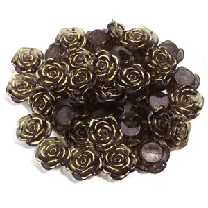 Nahaufnahme Detail von Harz Rosen Perlen, dunkler transparenter Stil mit feiner Goldkante.
