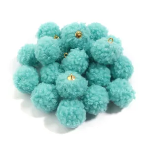 Fluffy 20mm teddy fleece pom pom charms with gold loop for DIY jewelry making crafts.