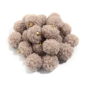 Fluffy teddy fur pom pom charms with gold loops for DIY jewelry, bag pendants, and earrings.