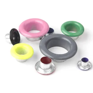 Detailed close-up of colorful metal eyelets and grommets for clothing, shoes, and bag DIY projects.