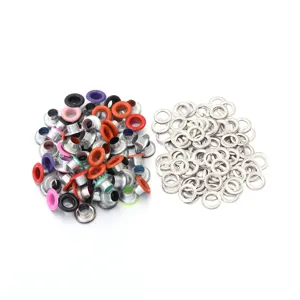 Detailed view of colorful eyelets and metal washers for clothing, bags and shoes DIY crafts.