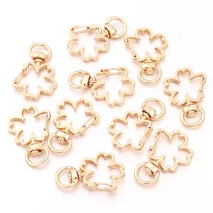 Gold cherry blossom metal clasp detail shot, DIY jewelry accessory part for handmade craft.