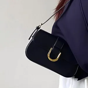 Black patent leather shoulder bag with gold horseshoe buckle vintage underarm bag for women