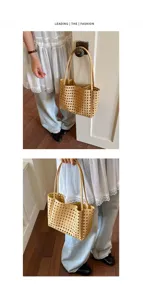 Woven hollow shoulder tote bag detail view, casual candy color handbag for women.
