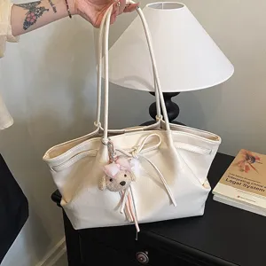 Korean style retro large capacity tote bag for women, PU leather casual shoulder bag with pendant.