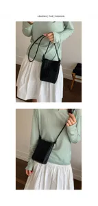 Black woven leather crossbody phone bag, minimalist chic mini shoulder bag for women.