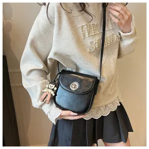 Minimalist fashion women crossbody phone bag, elegant black PU leather small shoulder bag for daily outfit.