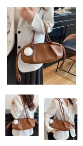 Brown soft leather shoulder bag, chic cloud dumpling design with cute fluffy pom-pom pendant.