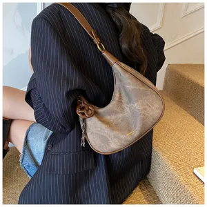 Borsa a tracolla hobo vintage da donna, elegante borsa a mezzaluna retrò con bordo marrone.