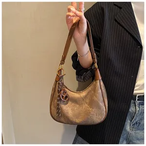 Borsa a tracolla hobo marrone vintage da donna, elegante borsa a mezzaluna alla moda.