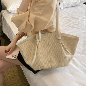 Woven tote bag for women, stylish large capacity single shoulder bag, minimalist lifestyle.