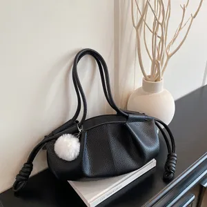 Black soft leather shoulder bag with cute white pom pom pendant, stylish daily commute cloud bag