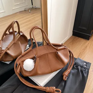 Women soft leather cloud bag stylish top-handle shoulder crossbody bag with cute fluffy pompom.