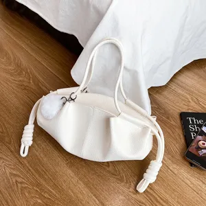 Women soft leather cloud shoulder bag, stylish commuter handbag with chic knot straps and plush charm.