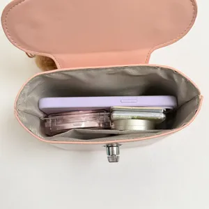 Pink structured box handbag with metal lock, top handle crossbody bag for women.