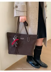 Vintage brown suede tote bag for women, large capacity shoulder handbag with cute bear charm.
