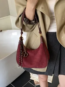 Stylish maroon suede shoulder bag for women, vintage hobo underarm bag with leather trim.