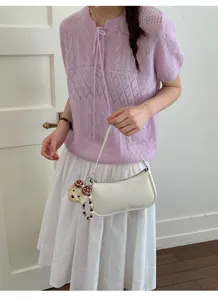 Minimalist casual women shoulder bag with cute bear charm, chic daily commuter handbag.