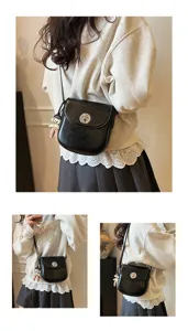 Minimalist fashion women small shoulder bag cross-body phone bag with cute doll pendant detail.