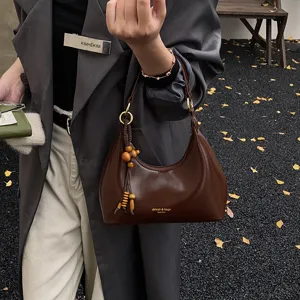 Brown PU leather hobo underarm bag vintage shoulder handbag with wooden bead tassel charm.