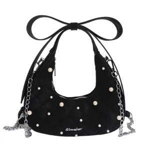 Black quilted hobo shoulder bag for women with pearls, metal chain, and large bow handle.