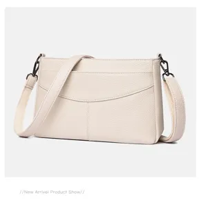 Genuine leather shoulder crossbody bag for women with top handle and stylish design.
