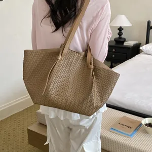 Minimalist woven leather shoulder tote bag for women, large capacity casual daily handbag.