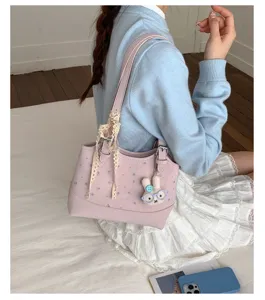 Pink floral shoulder bag for women, cute handbag with lace ribbon and rabbit pendant.