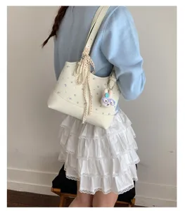 Korean style fashion floral shoulder bag for women, chic PU leather handbag with lace decor.