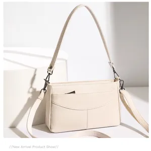 Elegant genuine leather shoulder bag for women, stylish top layer cowhide crossbody purse.