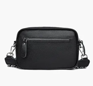 Black genuine leather women crossbody bag with wide strap, zipper pocket and chic design.