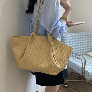 Woven tote bag for women, stylish large capacity shoulder bag with classic woven design.