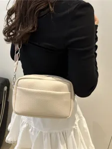 Trendy solid color PU leather crossbody bag for women, stylish shoulder camera bag main view