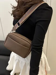 Trendy women brown PU leather crossbody bag with striped strap stylish daily shoulder bag