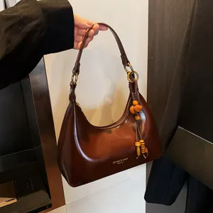 Vintage brown women underarm bag PU leather hobo handbag with wood bead charm pendant detail