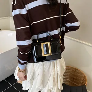 Trendy retro patent leather shoulder bag with chic gold buckle for women daily commute style