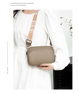 Detailed view of the solid litchi pattern women's crossbody bag, compact and chic style.