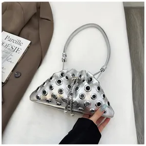 Silver metallic grommet shoulder bag, stylish pleated hobo purse with eyelet hollow-out design.