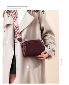 Stylish women's leather crossbody bag with wide patterned strap for daily casual commuting